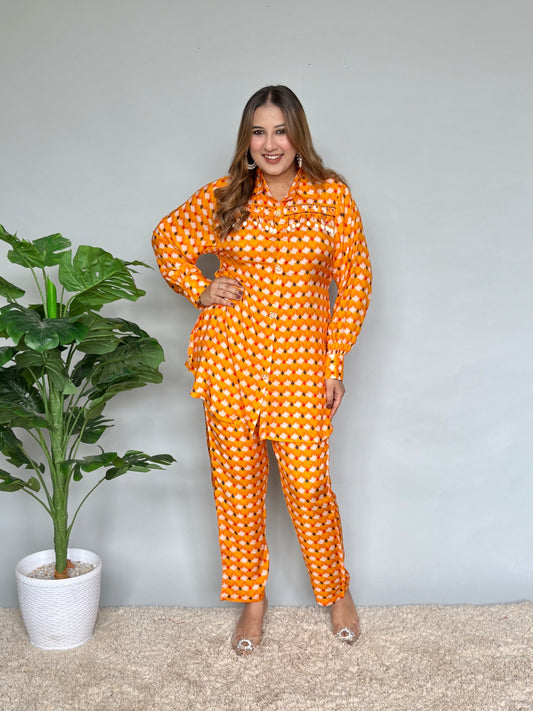 Orange Printed Cord Set With Shell Detailings